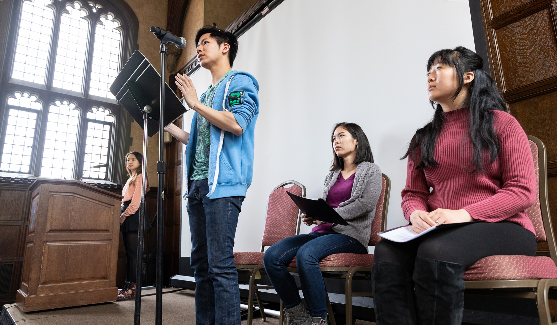 Left to right, Isabelle Cheng, Johnny Tran, Carolyn Hu-Bradbury, and Harmony Zhang, students in The Theatre School, performed “Asian Voices” during the event. (DePaul University/Jeff Carrion)